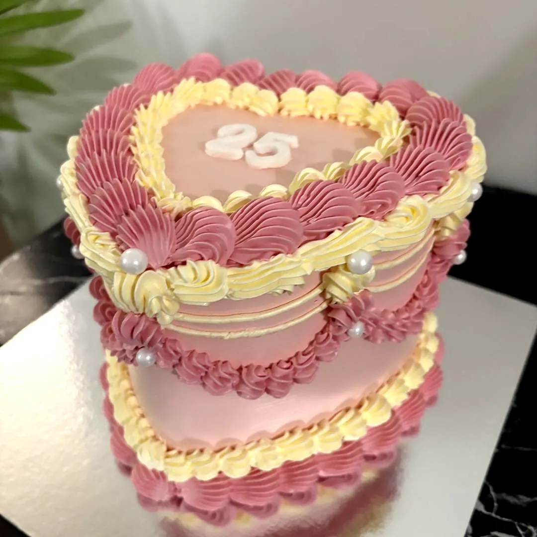 Elegant Heart-Shaped Cake for a Lovely 25th Birthday Celebration