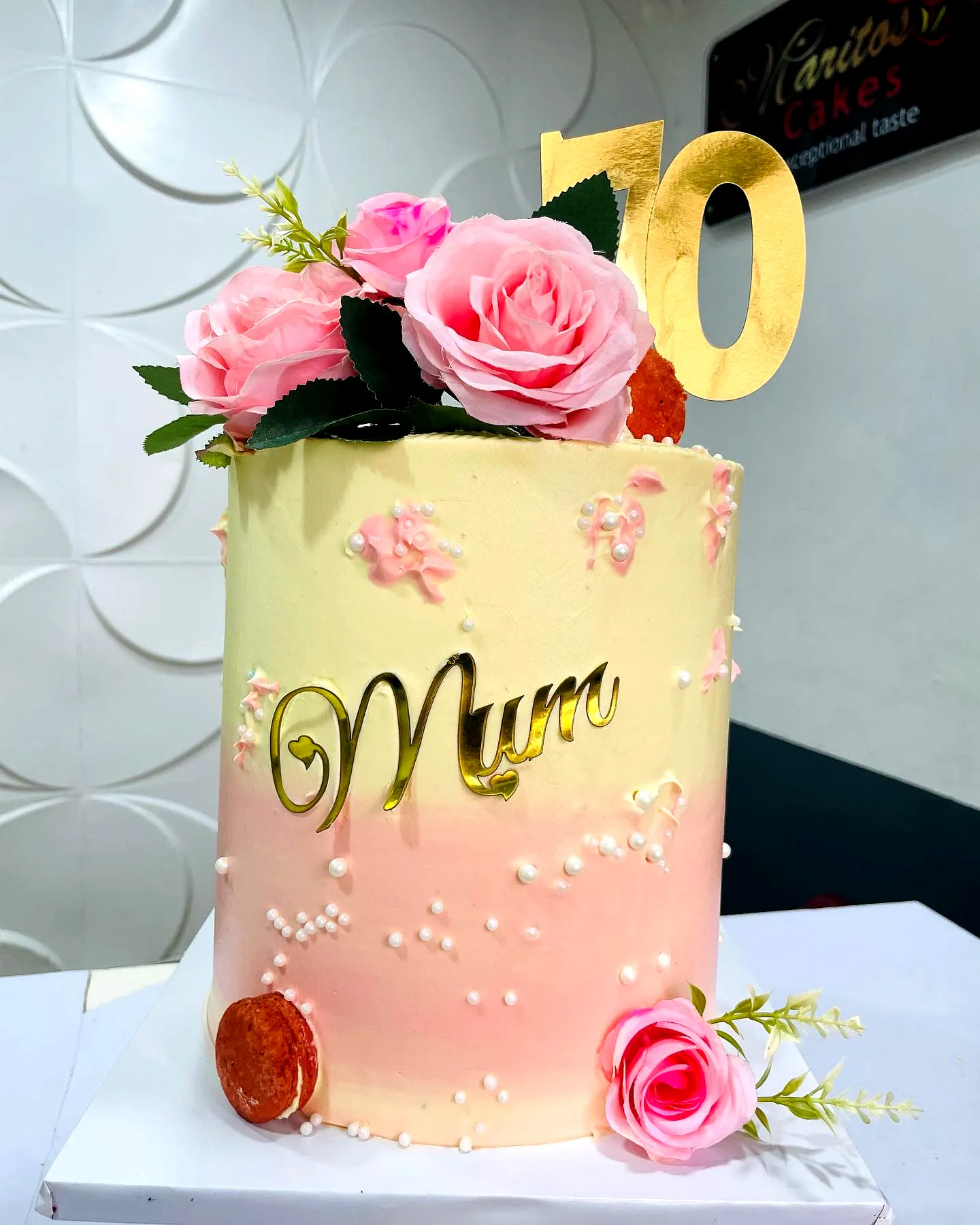Elegant mother birthday cake design with ombre pink and cream frosting