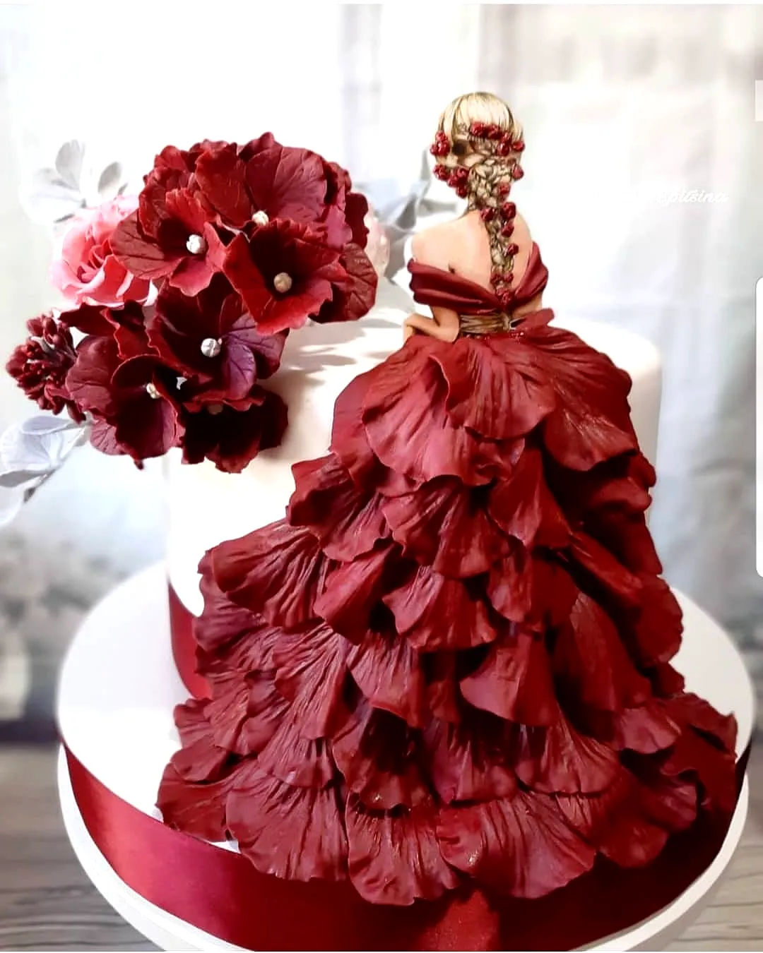 Elegant Red Birthday Cake Design with Sophisticated Fondant Ruffles and Flowers
