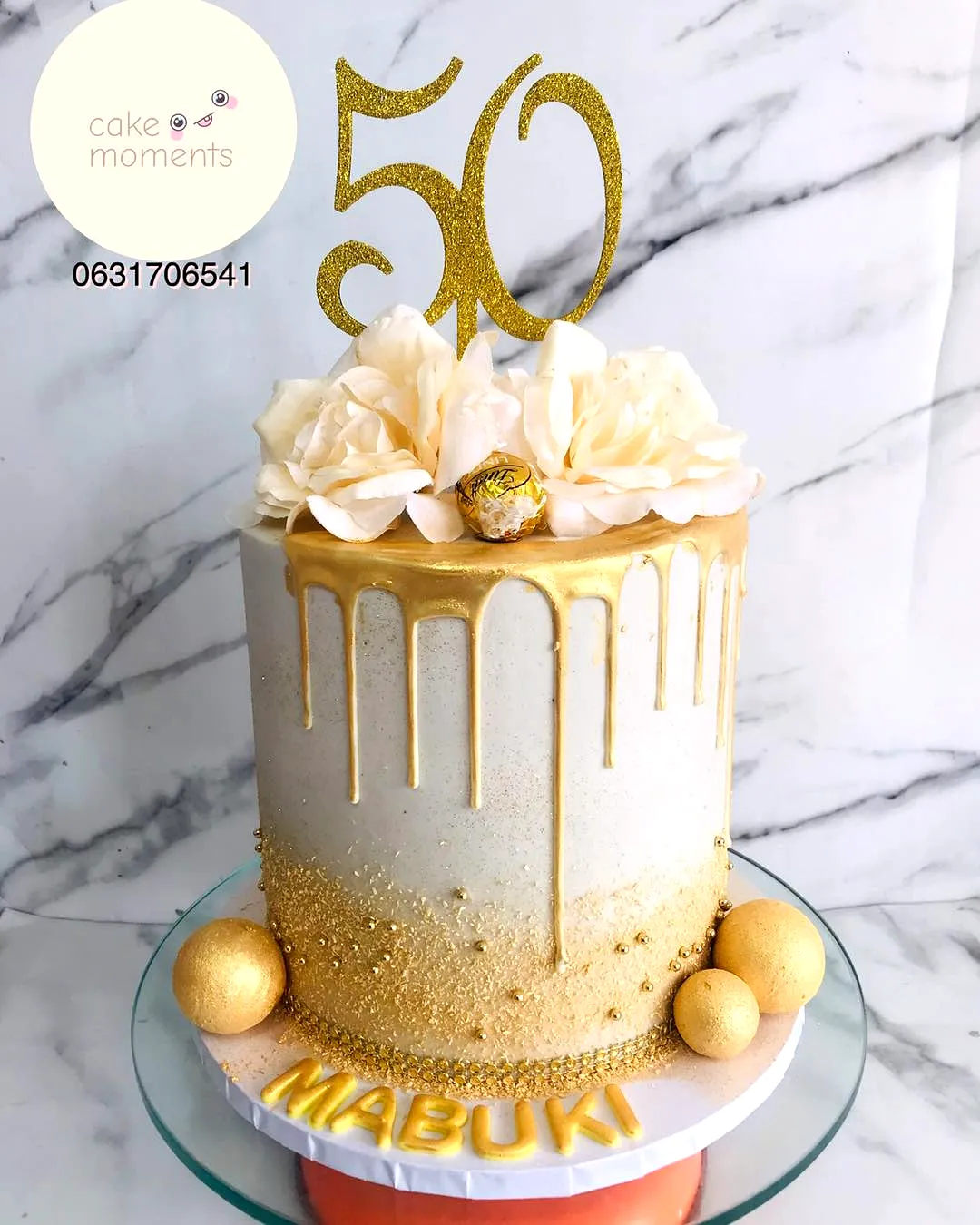 Elegant semi-naked vanilla cake for 50th birthday celebration for women