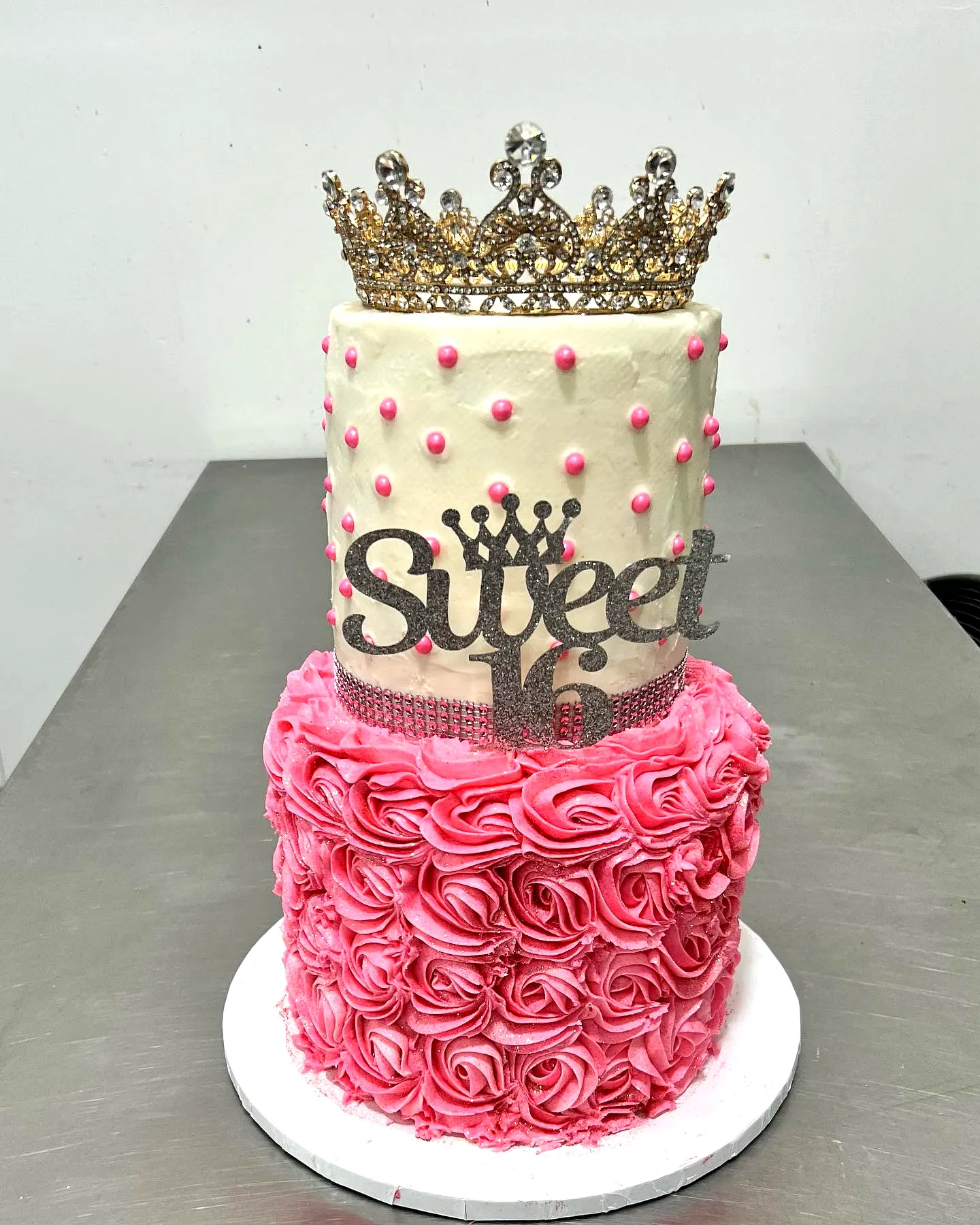 Elegant Sweet 16 Birthday Cake with Pink Rose Swirls and Regal Touches