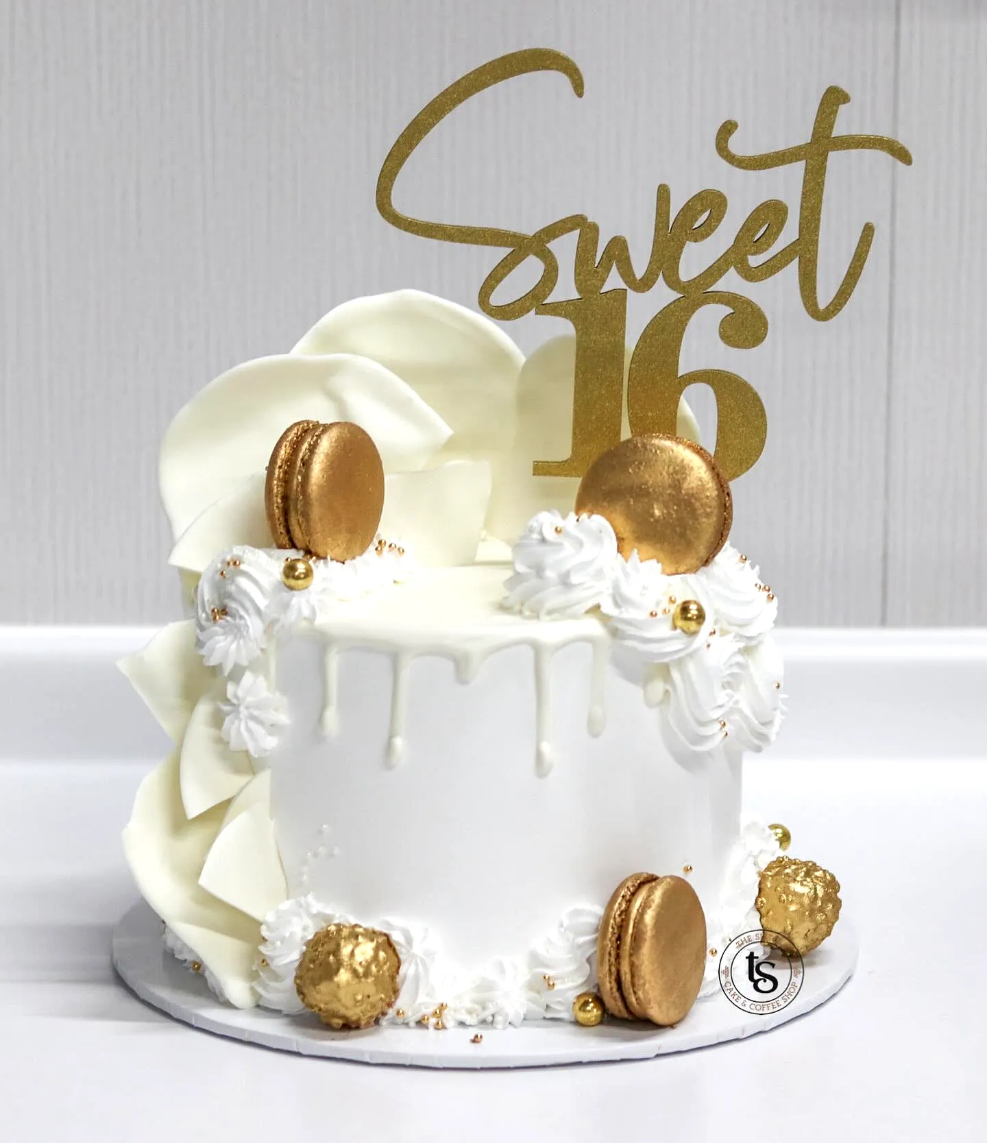 Elegant Vanilla Drip Cake for a Fun 16th Birthday Celebration