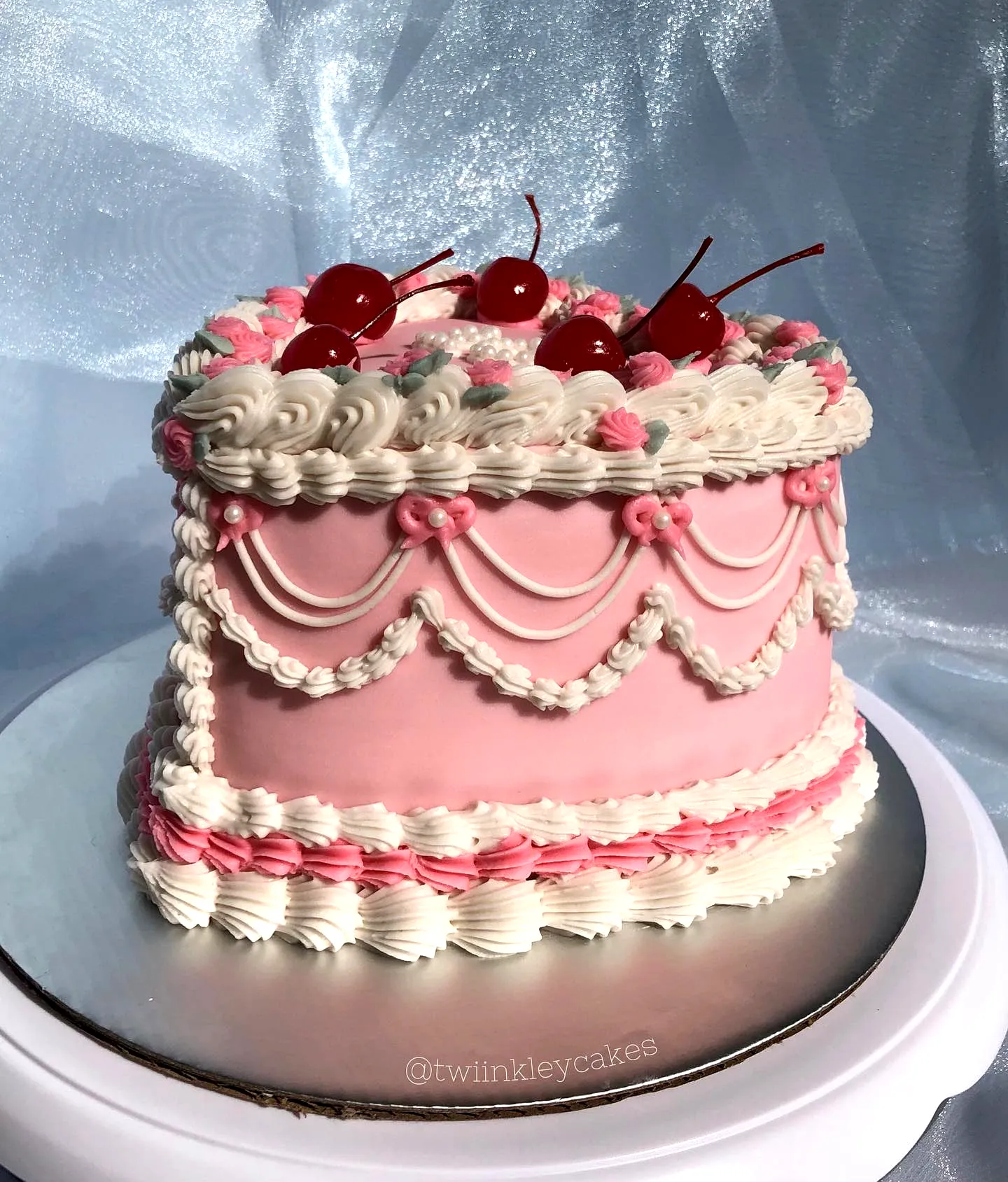 Elegant vintage 20th birthday cake design in soft pink and white