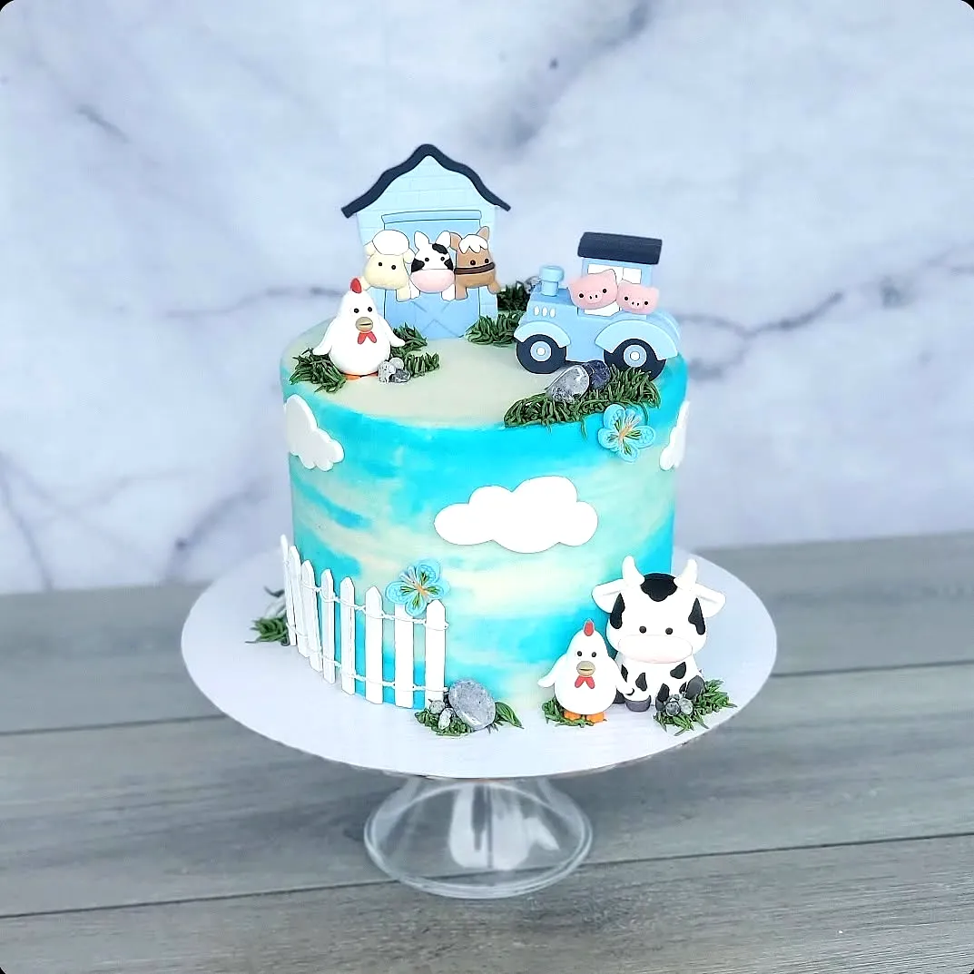 Fun farm birthday cake design with vibrant colors and adorable decorations