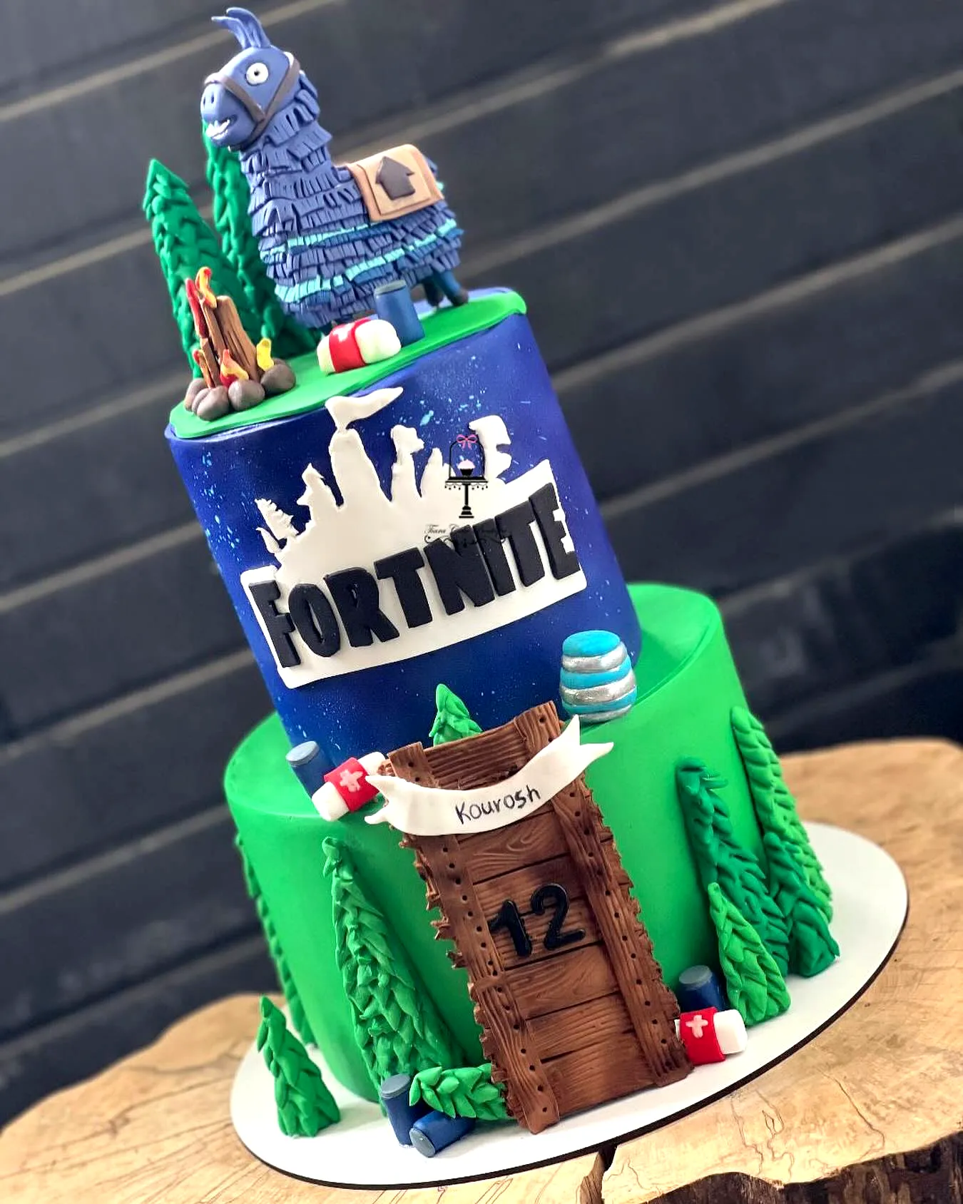 Fun Fortnite Birthday Cake Design with Colorful Layers and Creative Decorations
