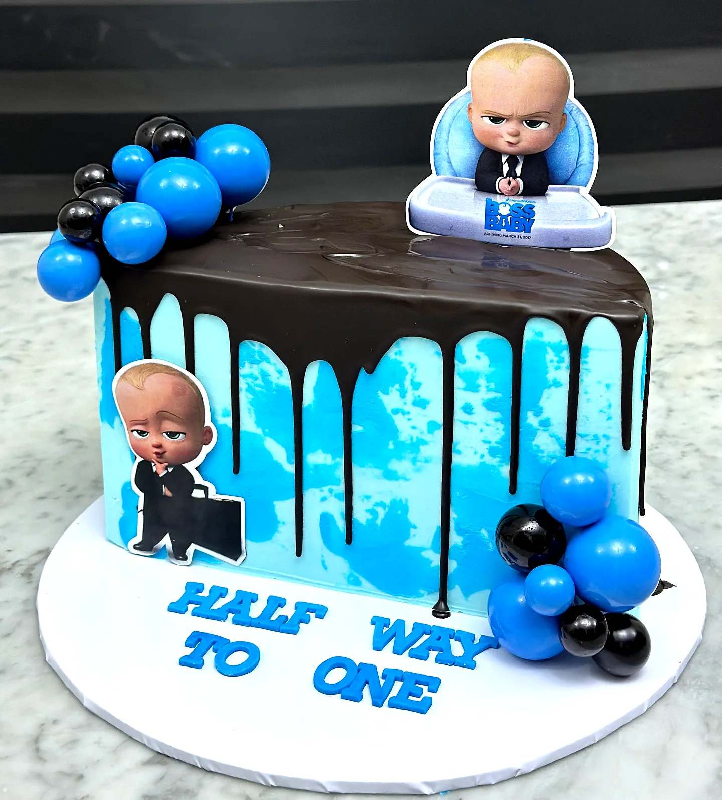 Funny birthday cake design for a cute Baby Boss celebration