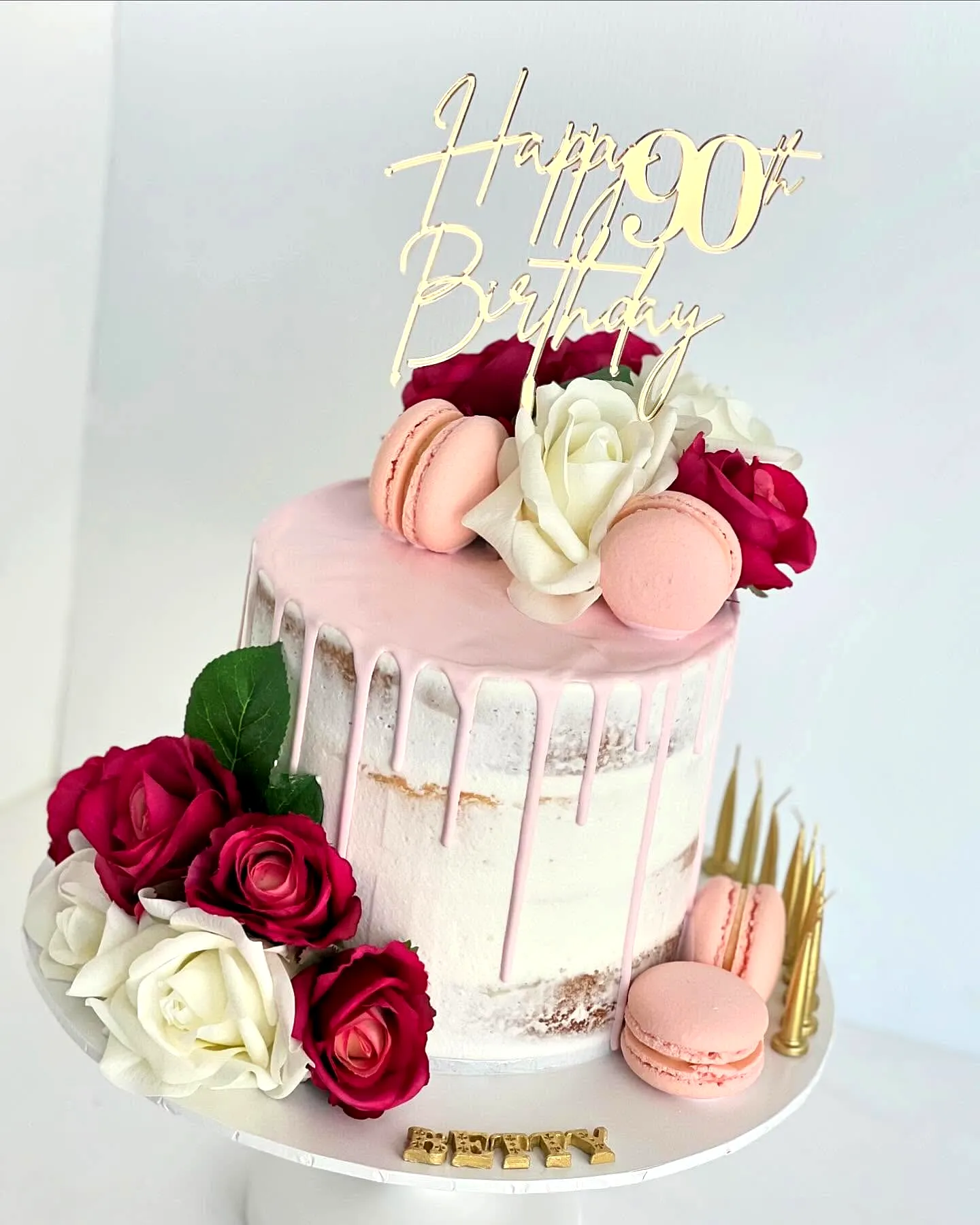 Lovely 90th Birthday Cake with Pink Drip and Elegant Floral Decorations