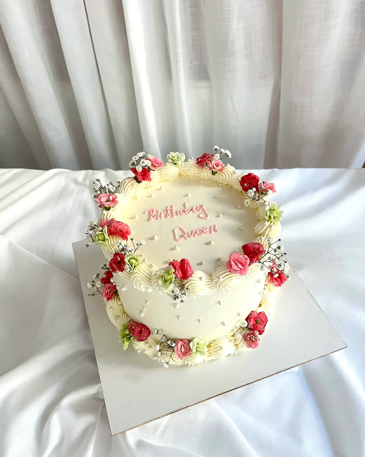Lovely ladies birthday cake design with elegant floral decorations