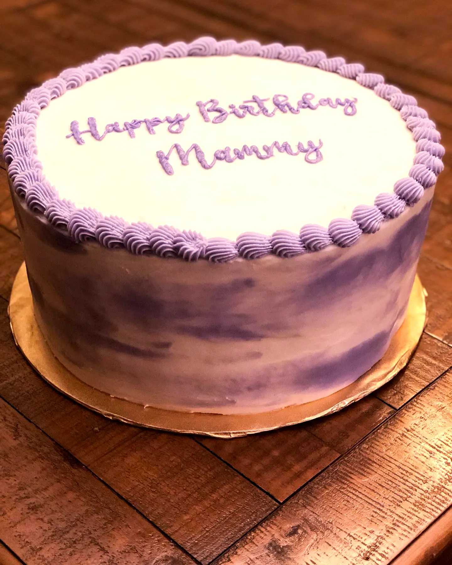 Lovely lavender birthday cake for mom with playful decorations
