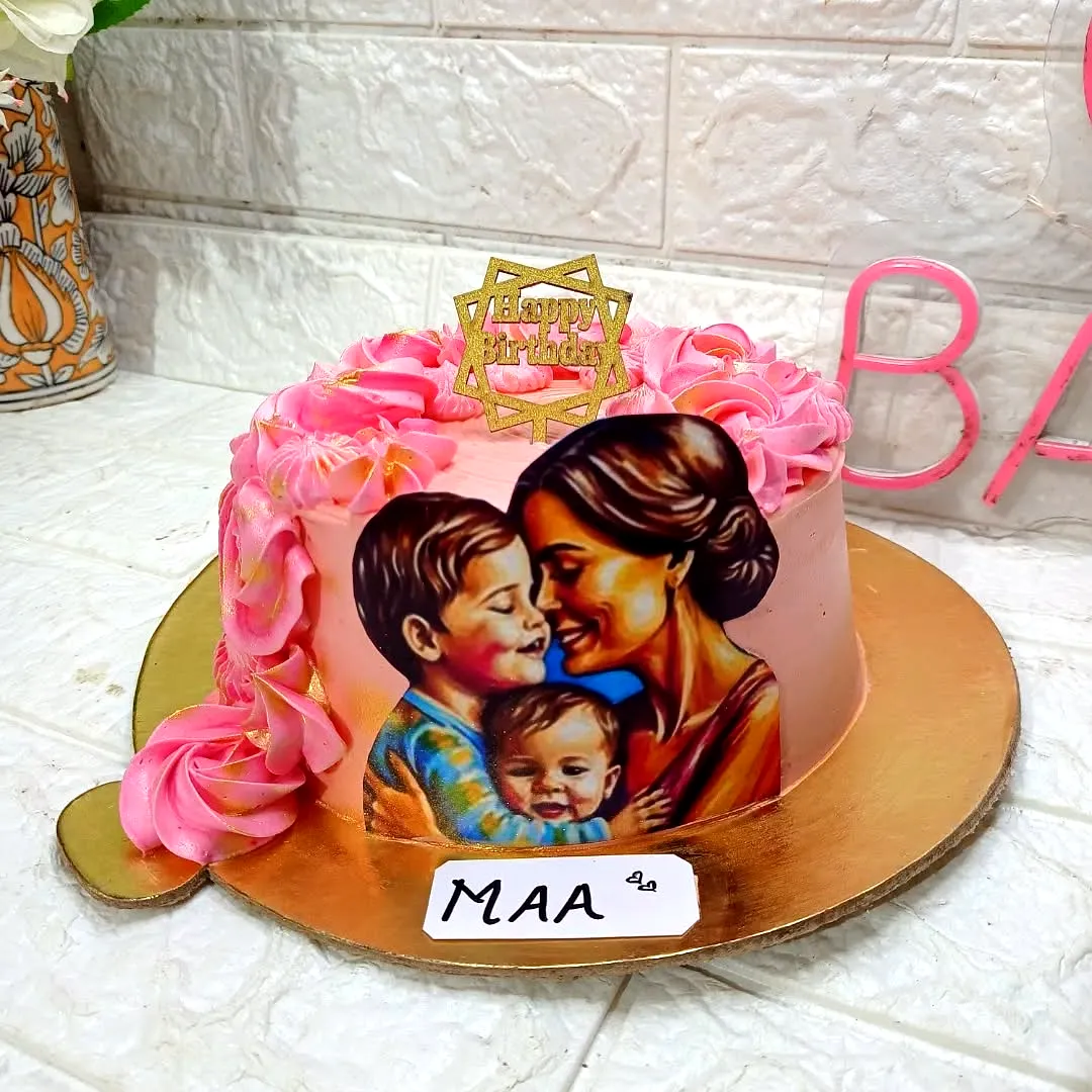 Lovely mother birthday cake design with soft pink buttercream and roses