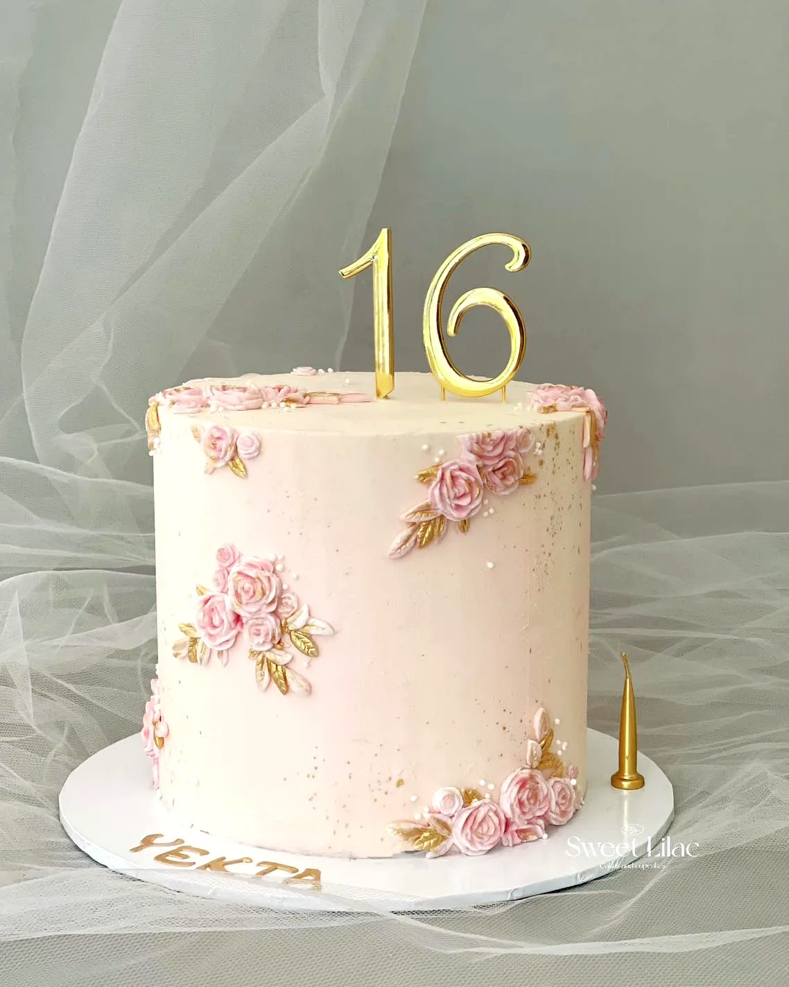 Lovely pale pink 16th birthday cake with elegant rose decorations