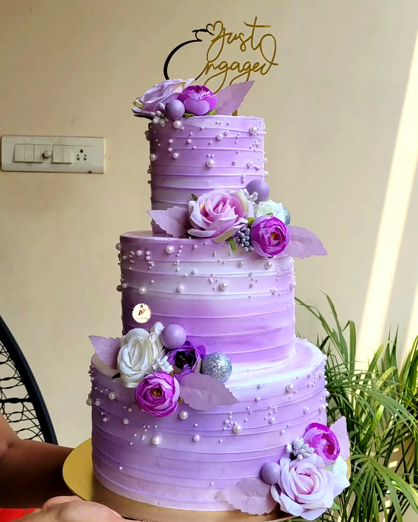 Lovely purple birthday cake design with elegant ombre and delicate decorations