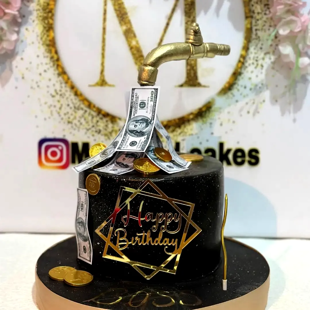 Luxurious Black Birthday Cake for Men with Golden Faucet and Sparkling Decor