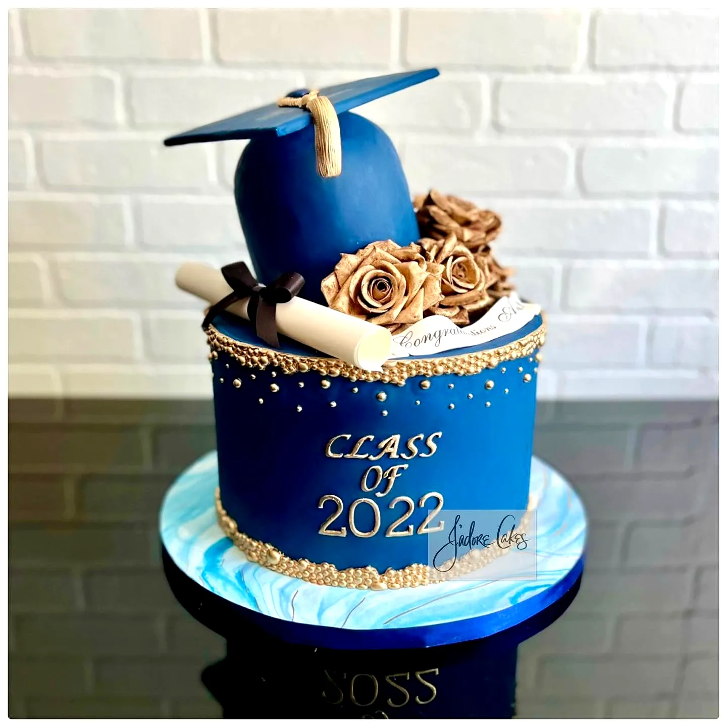 Stunning Blue and Gold Graduation Cake for a Modern Celebration