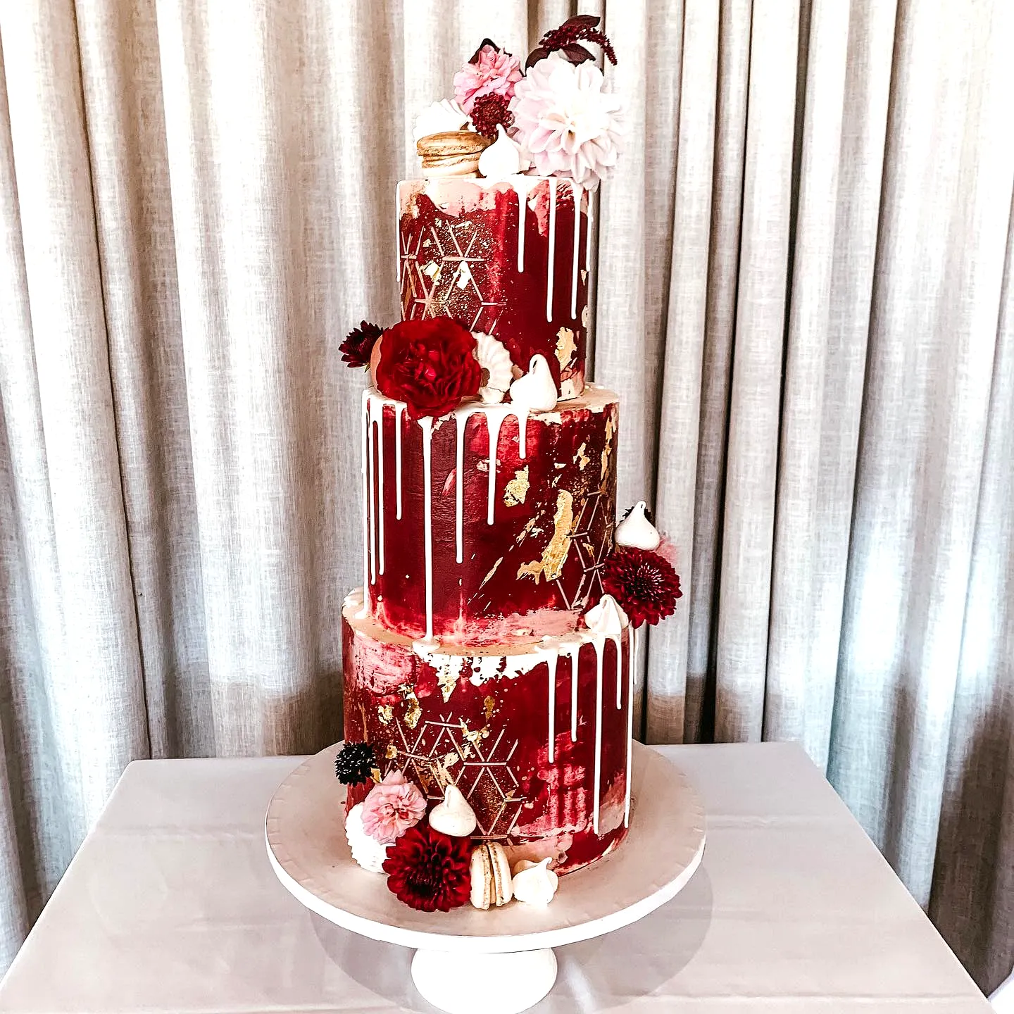 Stunning Burgundy Wedding Cake Design with Elegant Buttercream and Gold Accents