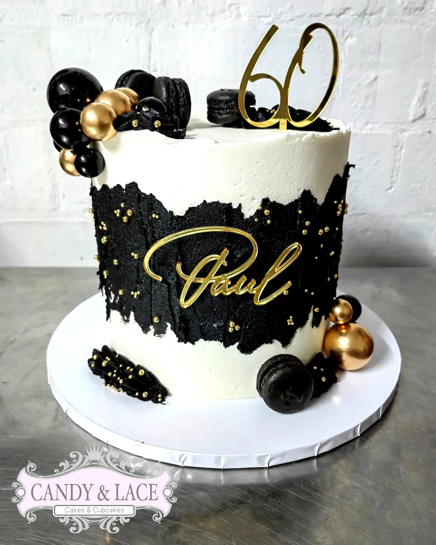 Stylish 60th Birthday Cake for a Man with Elegant Black and Gold Decor