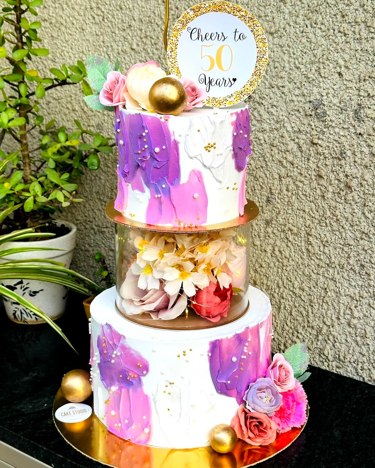 Stylish and Colorful 50th Birthday Cake for Women with Floral Elegance