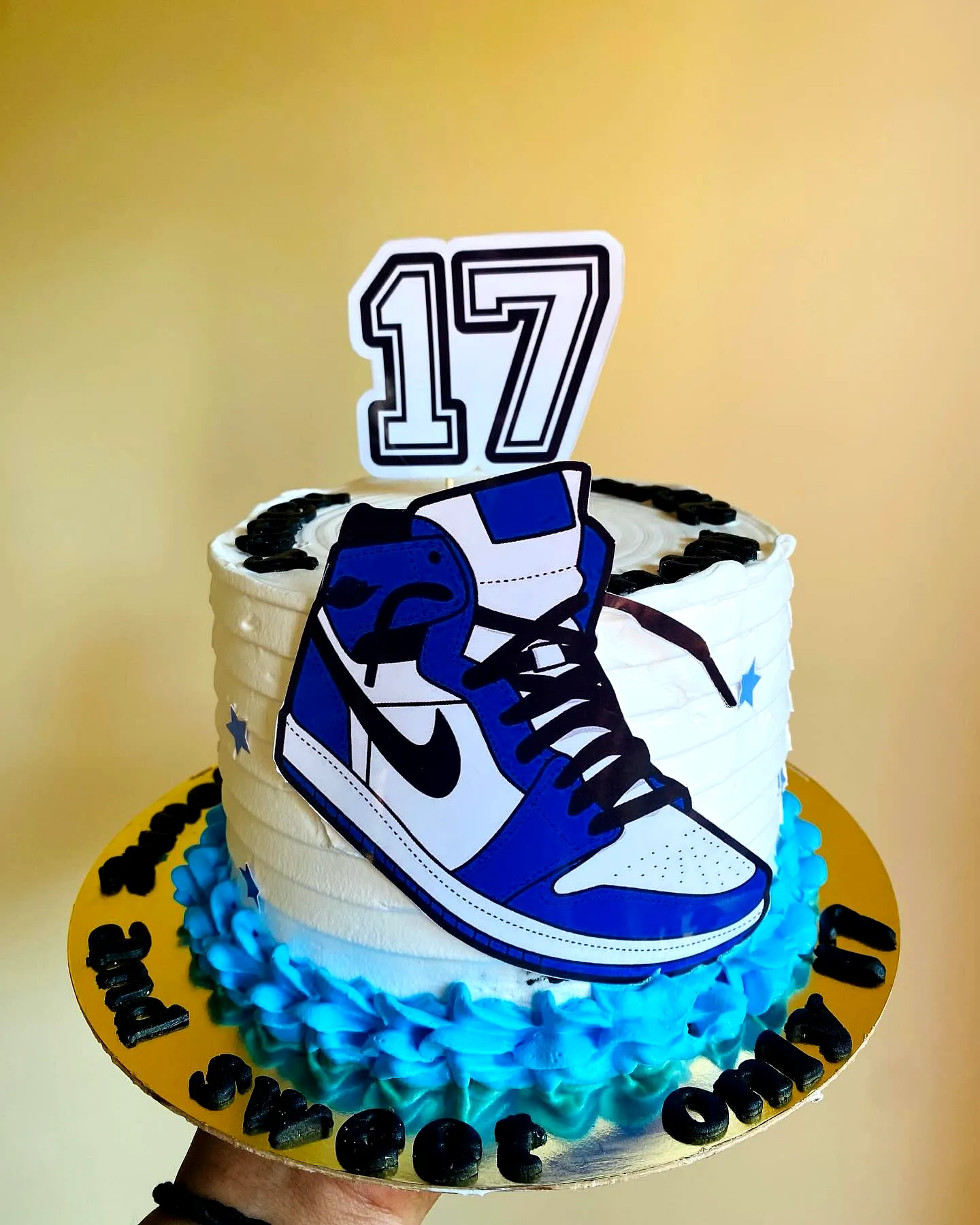 Trendy 17th Birthday Cake Featuring a Nike Air Jordan Design