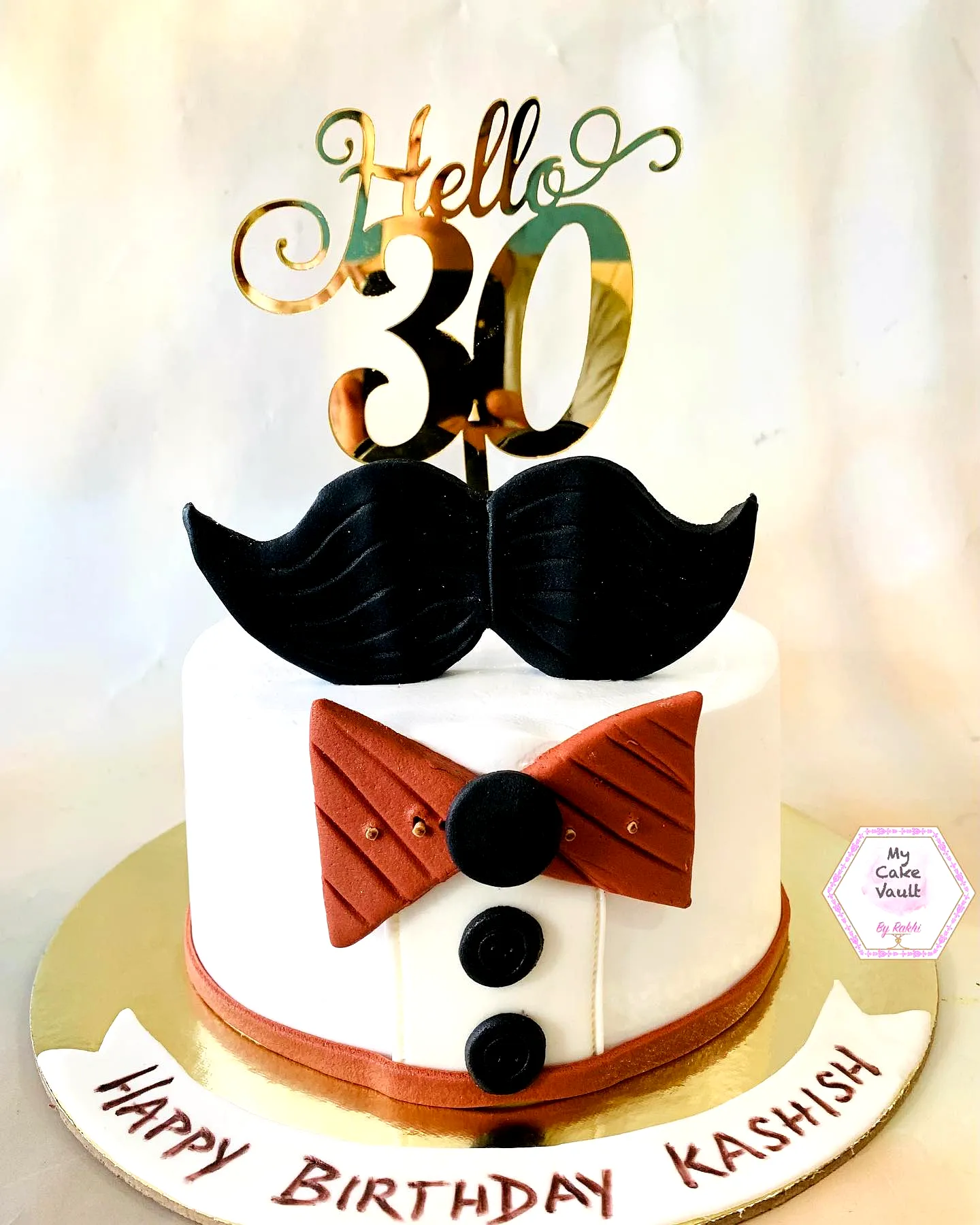 Trendy 30th birthday cake design in tuxedo style with a classy color palette