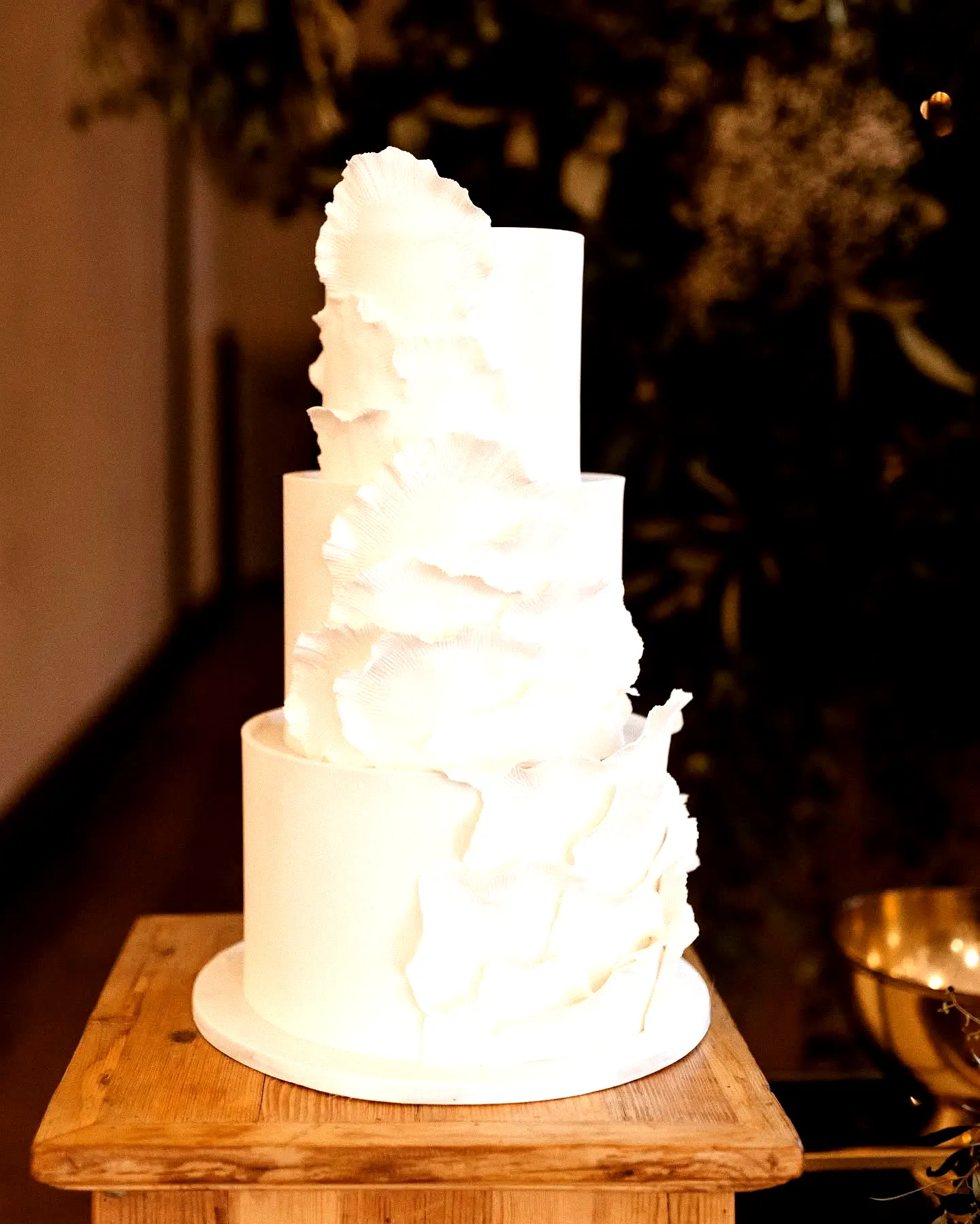Trendy Contemporary Wedding Cake Design with Elegant Ruffles and Minimalist Charm