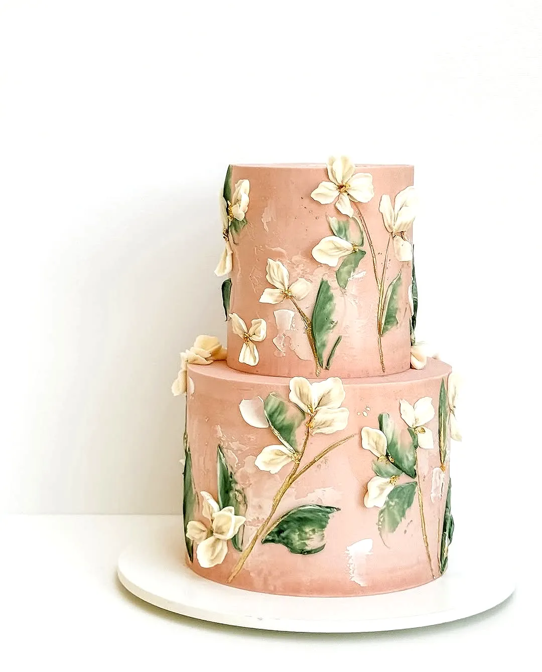 Trendy Contemporary Wedding Cake with Elegant Floral and Gold Accents