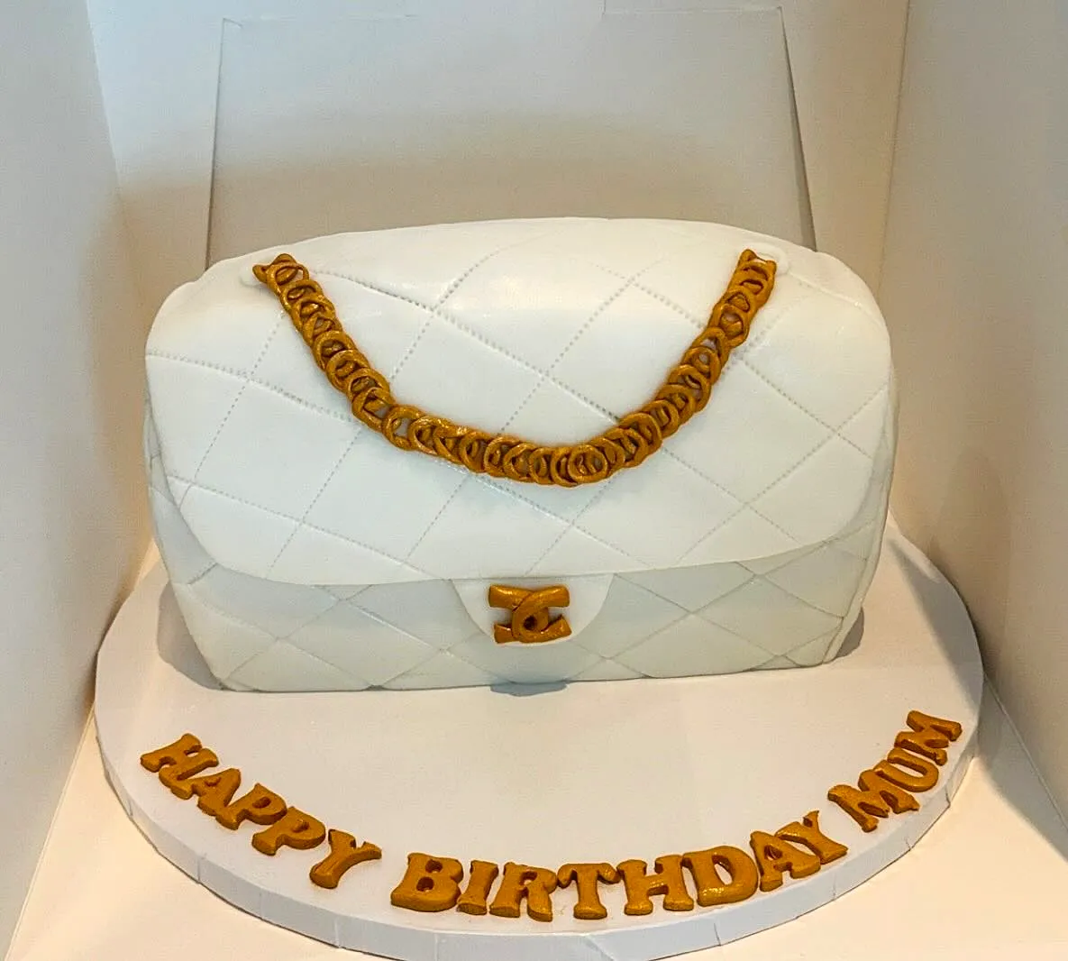 Trendy Handbag Cake Design for Moms Birthday Celebration