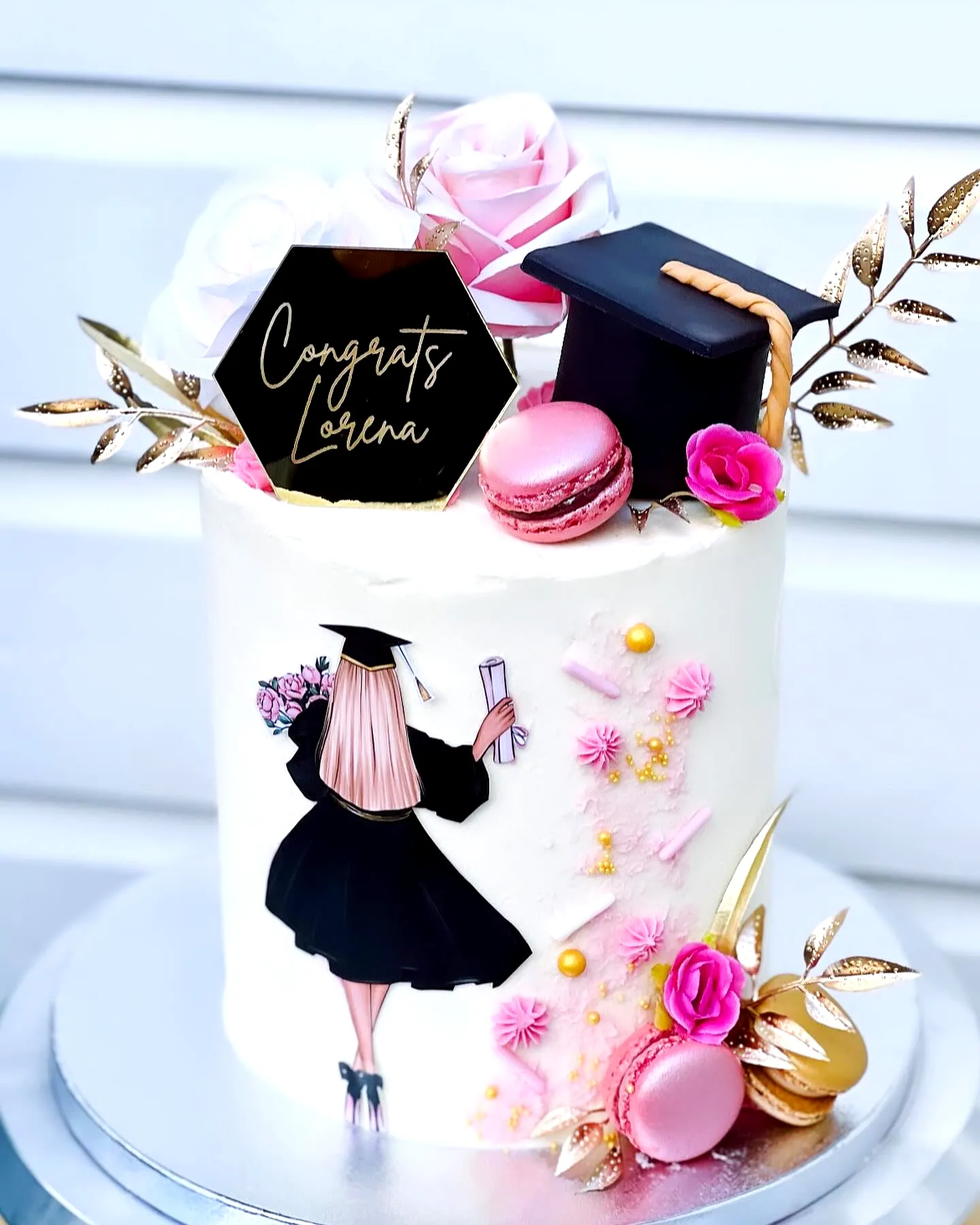 Trendy Pink Graduation Cake for a Chic Celebration