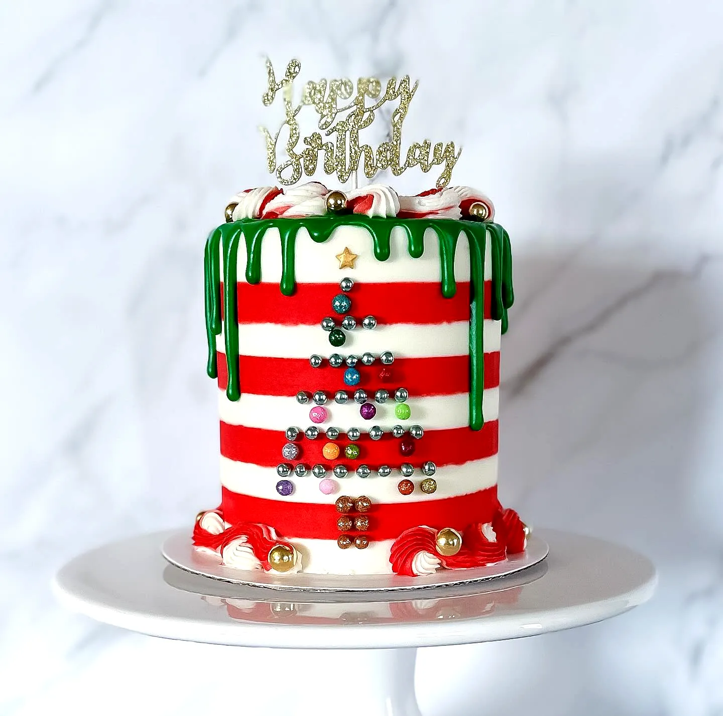 Vibrant Christmas Birthday Cake Design with Festive Decorations and Colors