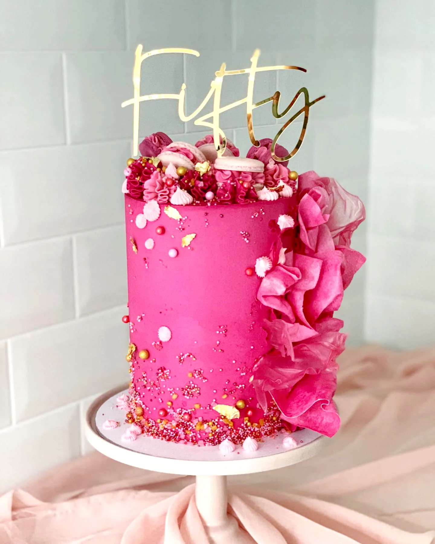Vibrant Pink Buttercream Cake for Womens 50th Birthday Celebration