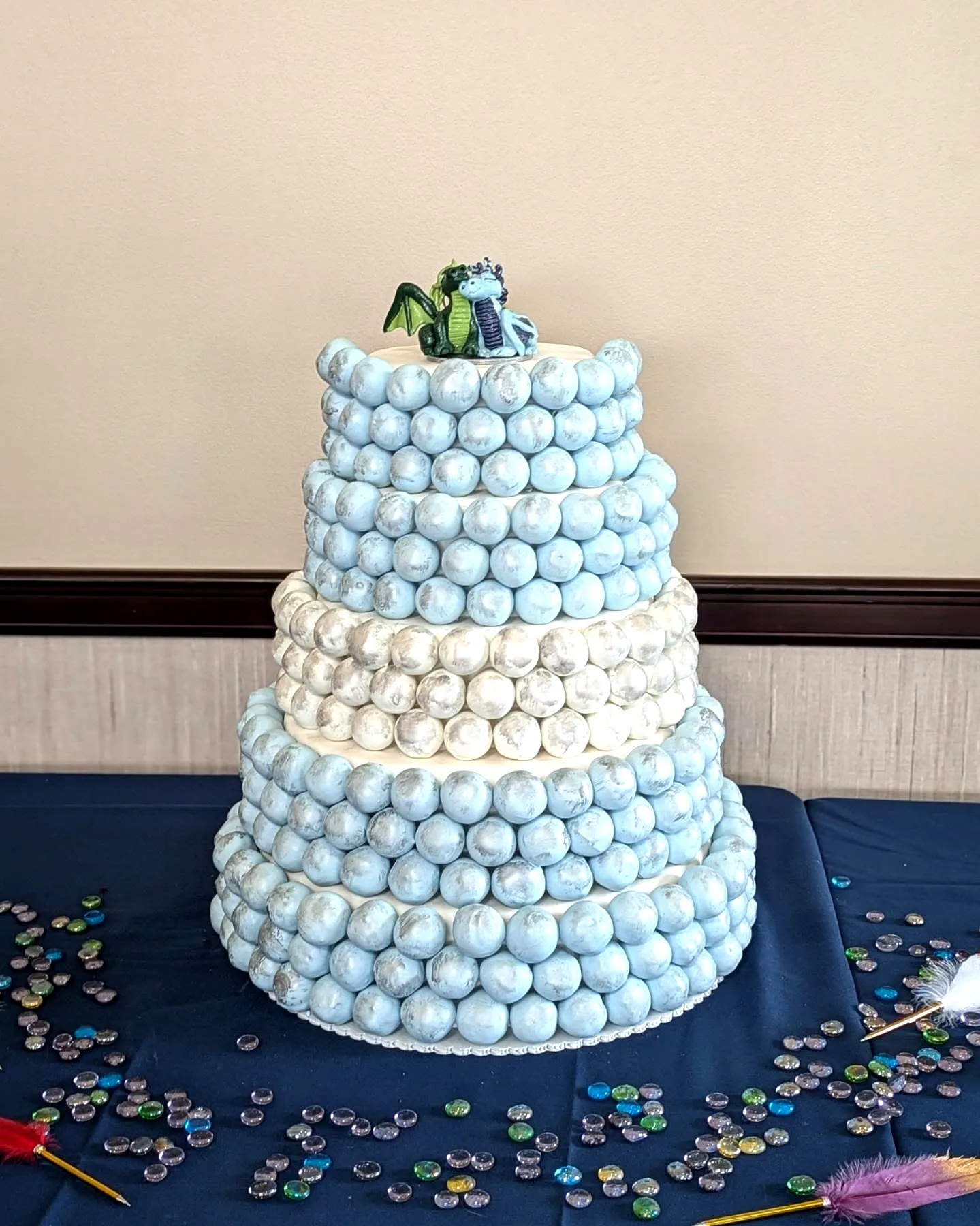 Whimsical Wedding Cake Pop Inspiration with Cute Dragon Design and Textured Frosting