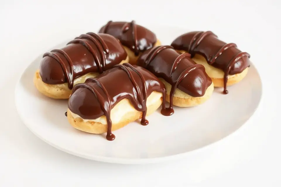 elegant chocolate drizzled eclair